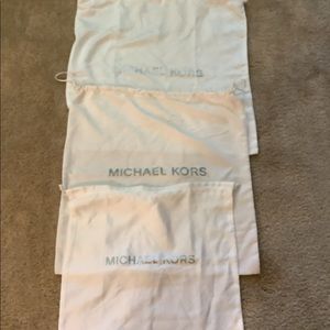 Michael Kors dust bags. Totally clean, kept folded in the closet.